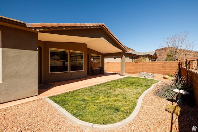 484 E Mohawk Dr, Kanab, UT 84741 - view of yard with a fenced backyard and a patio