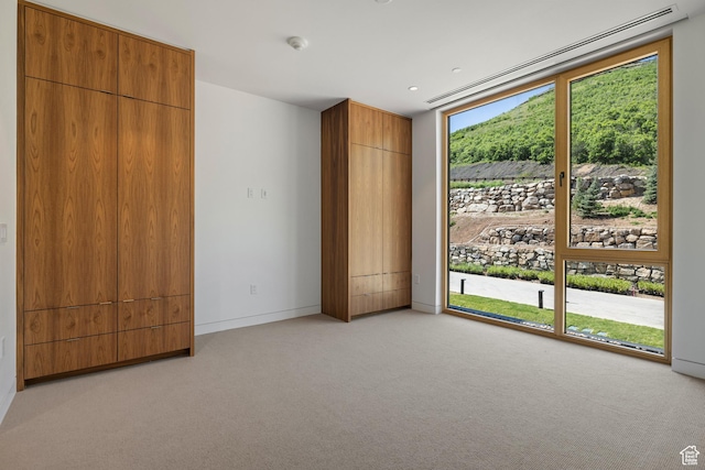 3267 W Deer Hollow Rd Unit 2402, Park City, UT 84060 - unfurnished bedroom with light colored carpet and baseboards