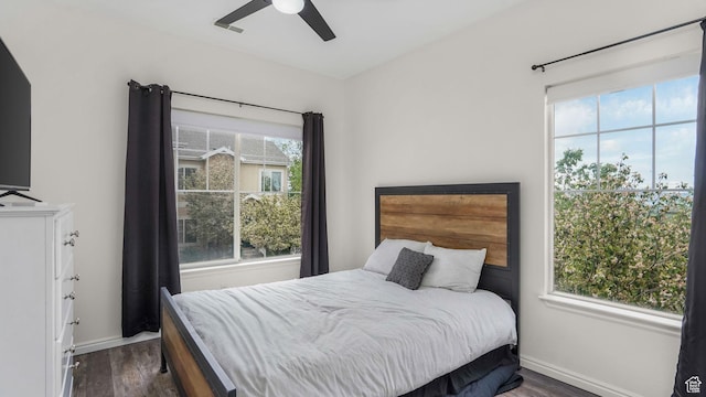 1138 S Meadow Fork Rd E Unit 3, Provo, UT 84606 - bedroom with dark wood-type flooring, baseboards, and a ceiling fan