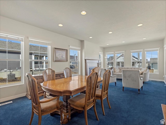 11126 S Kiwano Way S, Jordan, UT 84009 - dining room featuring recessed lighting, baseboards, dark carpet, and visible vents