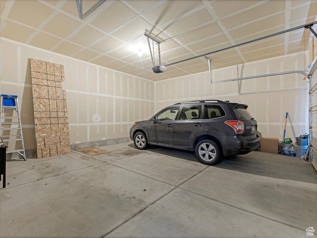11126 S Kiwano Way S, Jordan, UT 84009 - garage featuring a garage door opener