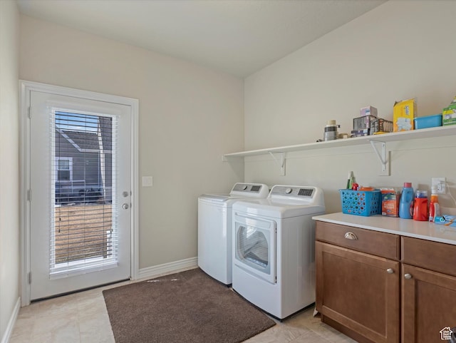 11126 S Kiwano Way S, Jordan, UT 84009 - laundry area featuring independent washer and dryer, cabinet space, and baseboards