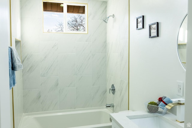 bathroom featuring vanity and washtub / shower combination