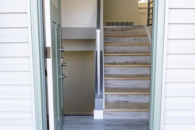 staircase with visible vents