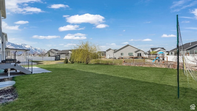 442 Doubleday St, Mapleton, UT 84664 - view of yard featuring fence, a playground, and a residential view