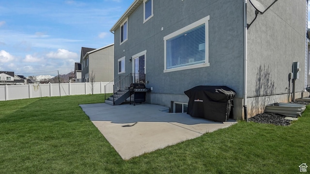 442 Doubleday St, Mapleton, UT 84664 - back of property with a lawn, stucco siding, fence, and a patio