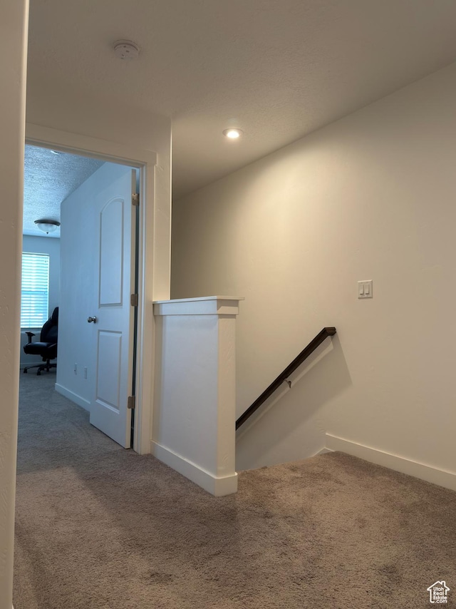 5264 S Tucker Ct W Unit 329, West Valley City, UT 84118 - stairway featuring carpet, baseboards, and recessed lighting
