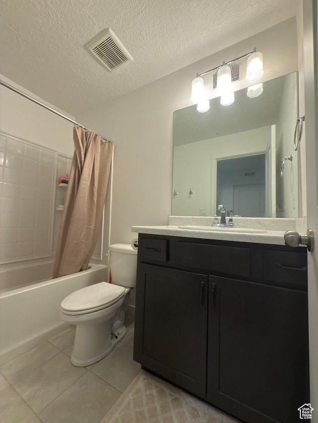 5264 S Tucker Ct W Unit 329, West Valley City, UT 84118 - full bathroom with a textured ceiling, visible vents, toilet, tile patterned floors, and shower / tub combo