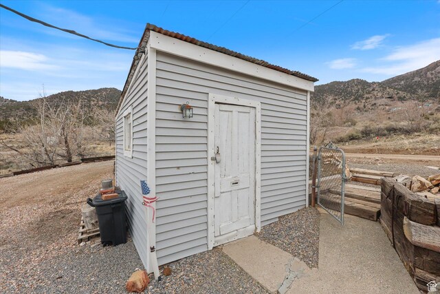 view of shed featuring a mountain view