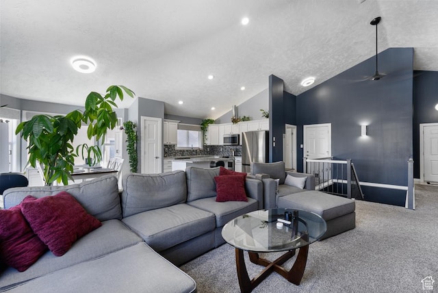6718 W Halter Creek Way S, West Valley City, UT 84128 - living room with high vaulted ceiling, light carpet, a textured ceiling, baseboards, and ceiling fan