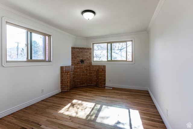 945 Church St, Layton, UT 84041 - empty room with ornamental molding, baseboards, and wood finished floors