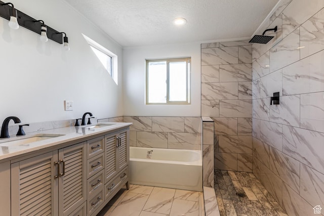 945 Church St, Layton, UT 84041 - full bathroom featuring marble finish floor, a textured ceiling, a sink, and a tile shower