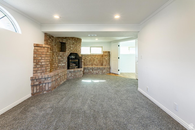 945 Church St, Layton, UT 84041 - unfurnished living room featuring baseboards, ornamental molding, carpet, and a brick fireplace