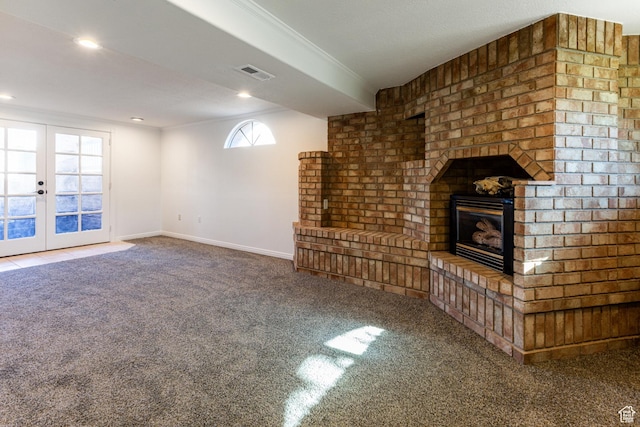 945 Church St, Layton, UT 84041 - unfurnished living room featuring carpet flooring, french doors, baseboards, visible vents, and a fireplace