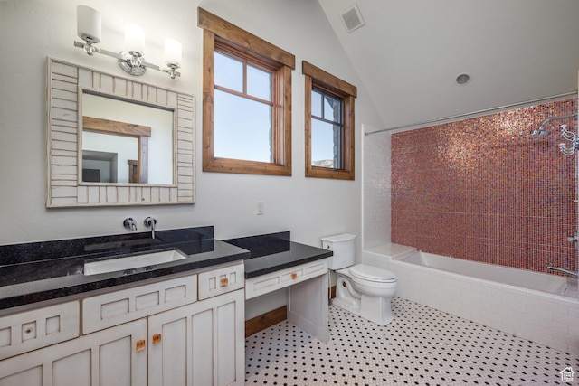 5956 N Triple Crown Trl, Oakley, UT 84055 - full bathroom with visible vents, tiled shower / bath combo, toilet, vanity, and lofted ceiling