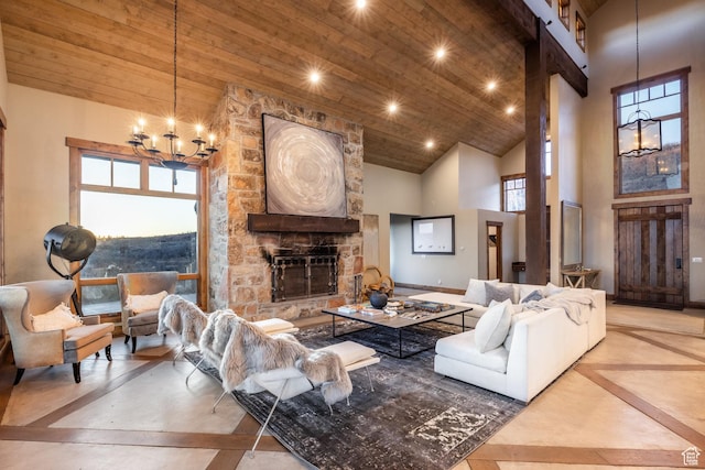 5956 N Triple Crown Trl, Oakley, UT 84055 - living room with wood ceiling, high vaulted ceiling, recessed lighting, a stone fireplace, and a notable chandelier