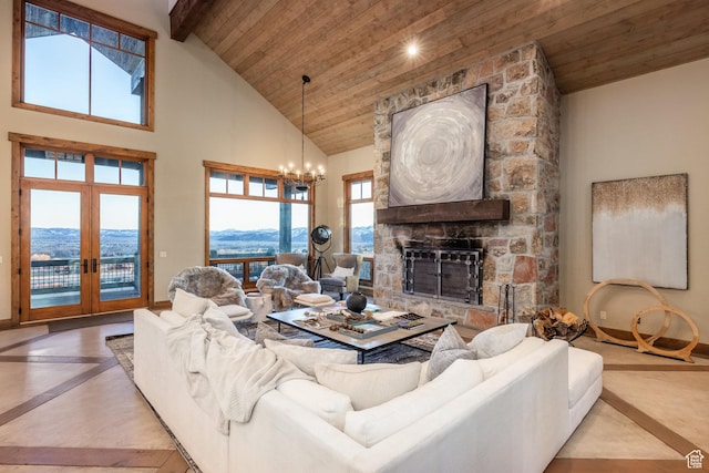 5956 N Triple Crown Trl, Oakley, UT 84055 - living room with baseboards, a fireplace, french doors, and wood ceiling