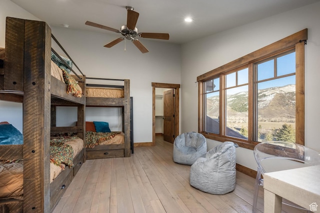 5956 N Triple Crown Trl, Oakley, UT 84055 - bedroom featuring hardwood / wood-style floors, baseboards, a mountain view, and recessed lighting