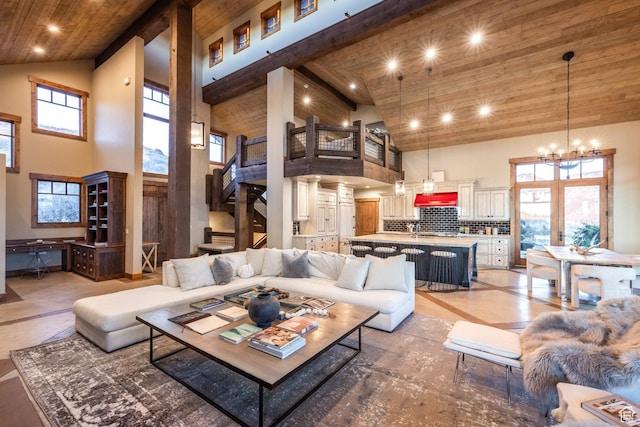 5956 N Triple Crown Trl, Oakley, UT 84055 - living area featuring high vaulted ceiling, wooden ceiling, beam ceiling, recessed lighting, and an inviting chandelier