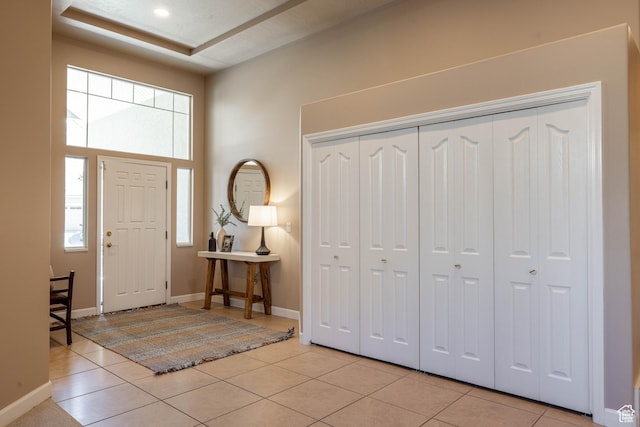 14146 S Spyglass Hill Dr, Draper, UT 84020 - foyer featuring plenty of natural light, light tile patterned floors, and baseboards