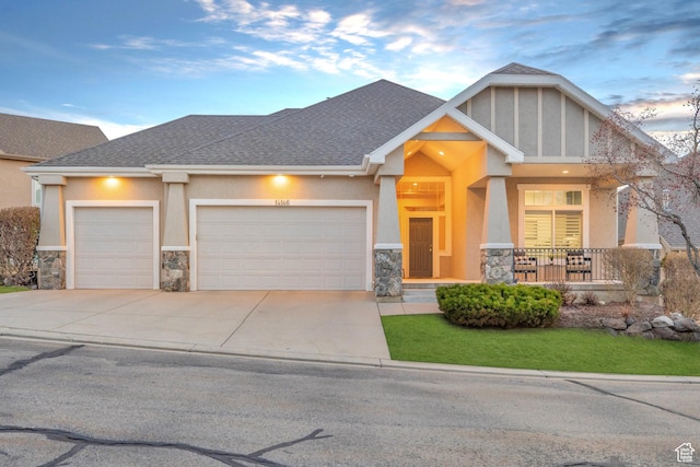 14146 S Spyglass Hill Dr, Draper, UT 84020 - craftsman-style house featuring stone siding, an attached garage, stucco siding, and driveway