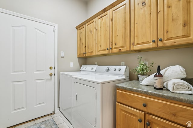 14146 S Spyglass Hill Dr, Draper, UT 84020 - washroom featuring cabinet space, washer and dryer, and light tile patterned flooring
