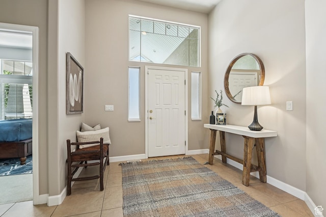 14146 S Spyglass Hill Dr, Draper, UT 84020 - entryway with light tile patterned flooring and a towering ceiling