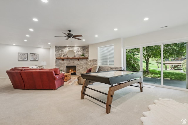 14146 S Spyglass Hill Dr, Draper, UT 84020 - recreation room featuring recessed lighting, a fireplace, ceiling fan, and light carpet