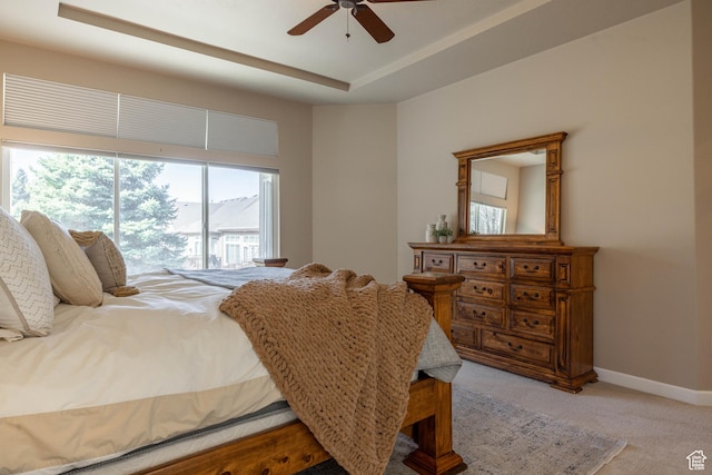 14146 S Spyglass Hill Dr, Draper, UT 84020 - bedroom featuring light colored carpet, a raised ceiling, baseboards, and a ceiling fan
