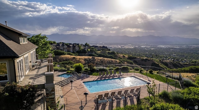 14146 S Spyglass Hill Dr, Draper, UT 84020 - community pool with a patio and a mountain view