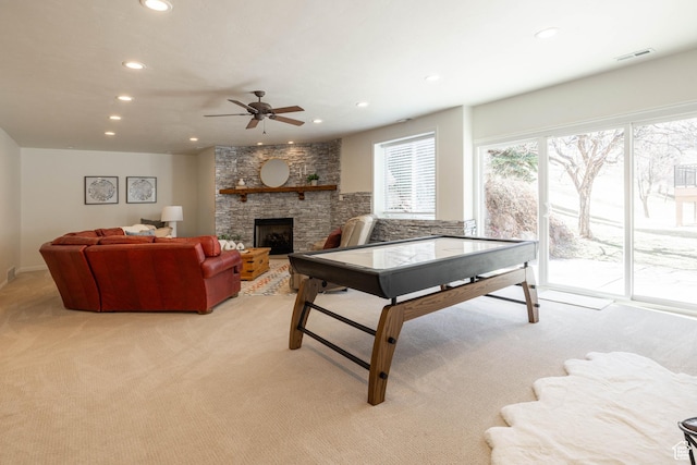 14146 S Spyglass Hill Dr, Draper, UT 84020 - recreation room featuring recessed lighting, ceiling fan, light colored carpet, and a fireplace