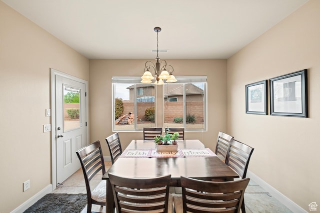 1041 E Silver Shadows Dr, Washington, UT 84780 - dining room featuring a notable chandelier and baseboards