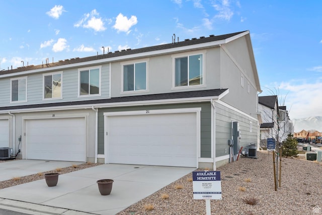 78 N Pilot St Unit 1840, Saratoga Springs, UT 84045 - view of property with an attached garage, central air condition unit, and concrete driveway