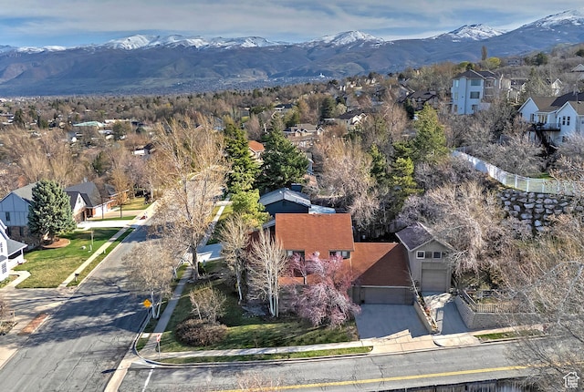 aerial view featuring a mountain view and a residential view
