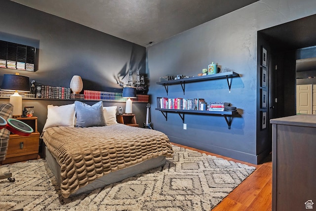 178 N Valley View Dr, North Salt Lake, UT 84054 - bedroom featuring baseboards and wood finished floors