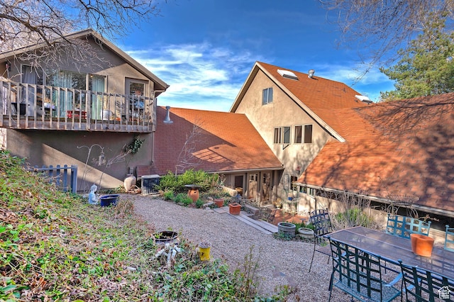 178 N Valley View Dr, North Salt Lake, UT 84054 - back of house featuring outdoor dining space and stucco siding
