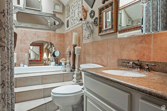 178 N Valley View Dr, North Salt Lake, UT 84054 - full bathroom featuring tiled bath, toilet, vanity, and tile walls