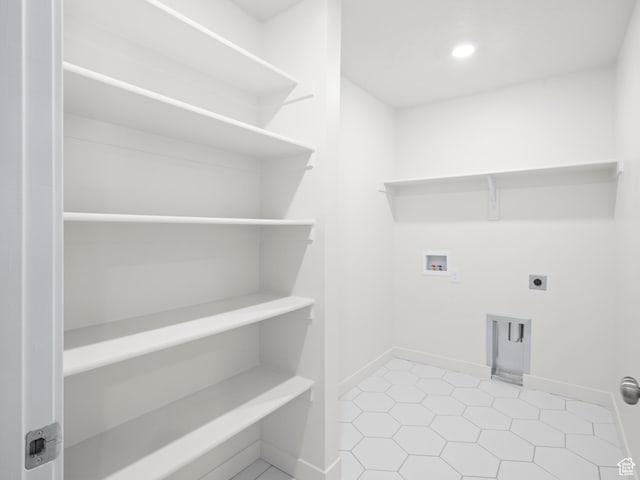 963 W Ruddy Clover Ln Unit 282, Saratoga Springs, UT 84045 - laundry area featuring baseboards, laundry area, hookup for an electric dryer, and hookup for a washing machine