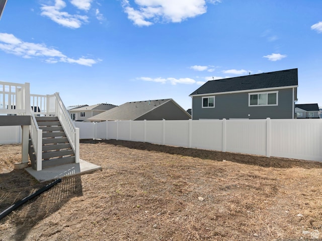 963 W Ruddy Clover Ln Unit 282, Saratoga Springs, UT 84045 - view of yard featuring a fenced backyard and stairway