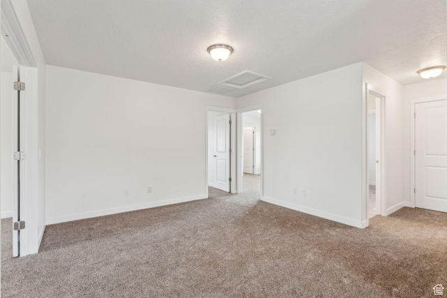 4 E Sterling Loop, Vineyard, UT 84059 - unfurnished bedroom with baseboards, a textured ceiling, carpet, and attic access