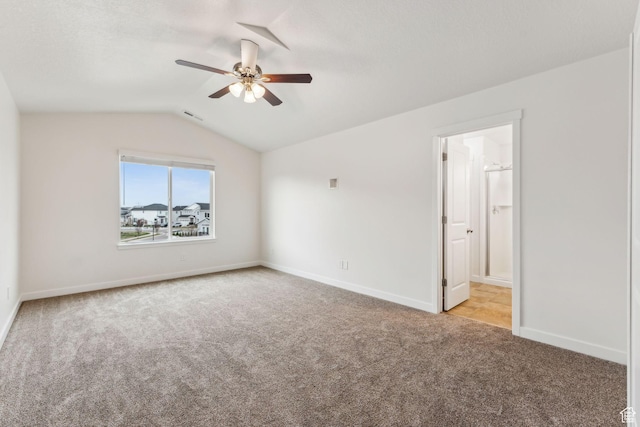 4 E Sterling Loop, Vineyard, UT 84059 - spare room featuring vaulted ceiling, baseboards, carpet floors, visible vents, and ceiling fan