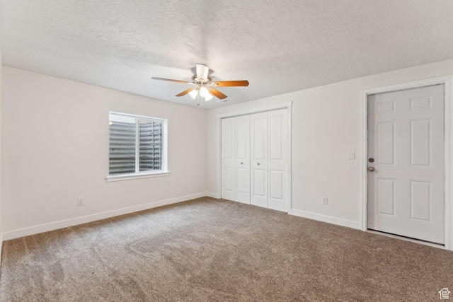 4 E Sterling Loop, Vineyard, UT 84059 - unfurnished bedroom featuring baseboards, a textured ceiling, a closet, and carpet