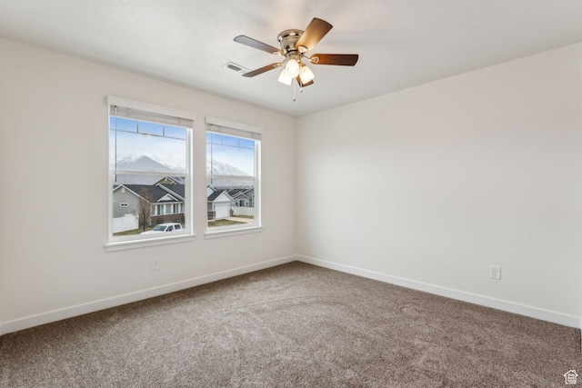 4 E Sterling Loop, Vineyard, UT 84059 - empty room with baseboards, carpet floors, visible vents, and a ceiling fan