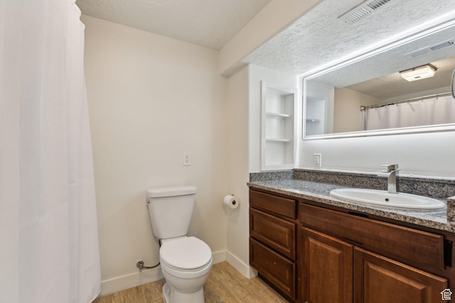 4 E Sterling Loop, Vineyard, UT 84059 - bathroom with toilet, visible vents, wood finished floors, and vanity