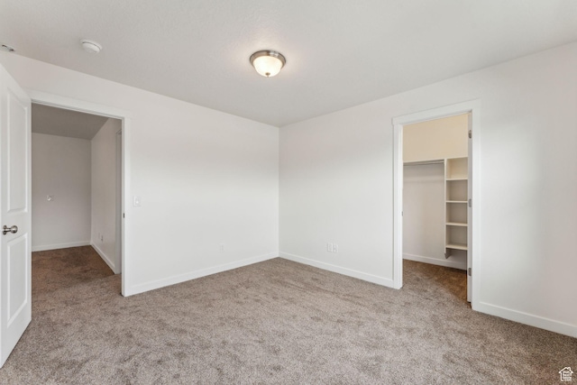 4 E Sterling Loop, Vineyard, UT 84059 - unfurnished bedroom with carpet flooring, baseboards, and a spacious closet