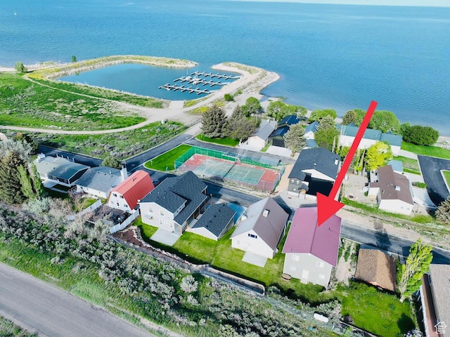 aerial view with a residential view and a water view