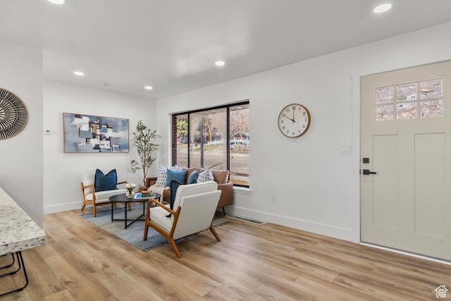 223 N Harrison Blvd, Ogden, UT 84404 - living area with baseboards, light wood-type flooring, visible vents, and recessed lighting