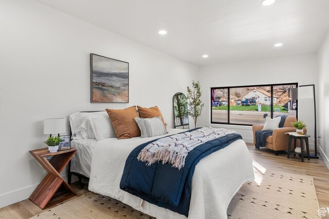 223 N Harrison Blvd, Ogden, UT 84404 - bedroom featuring baseboards, wood finished floors, and recessed lighting