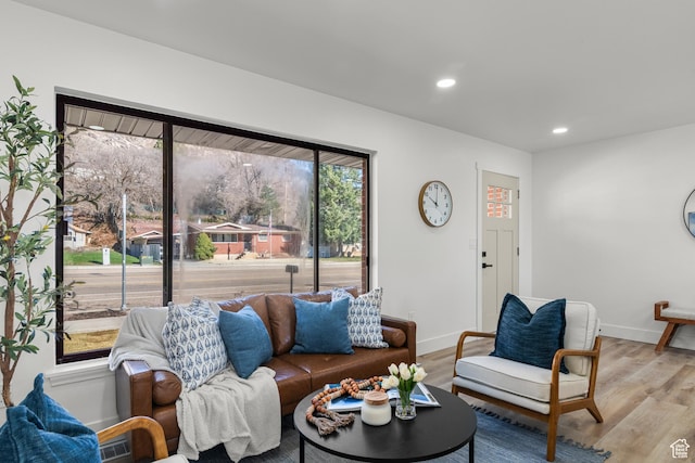 223 N Harrison Blvd, Ogden, UT 84404 - living area with baseboards, light wood-style floors, and recessed lighting