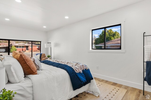 223 N Harrison Blvd, Ogden, UT 84404 - bedroom with recessed lighting, multiple windows, and light wood-type flooring